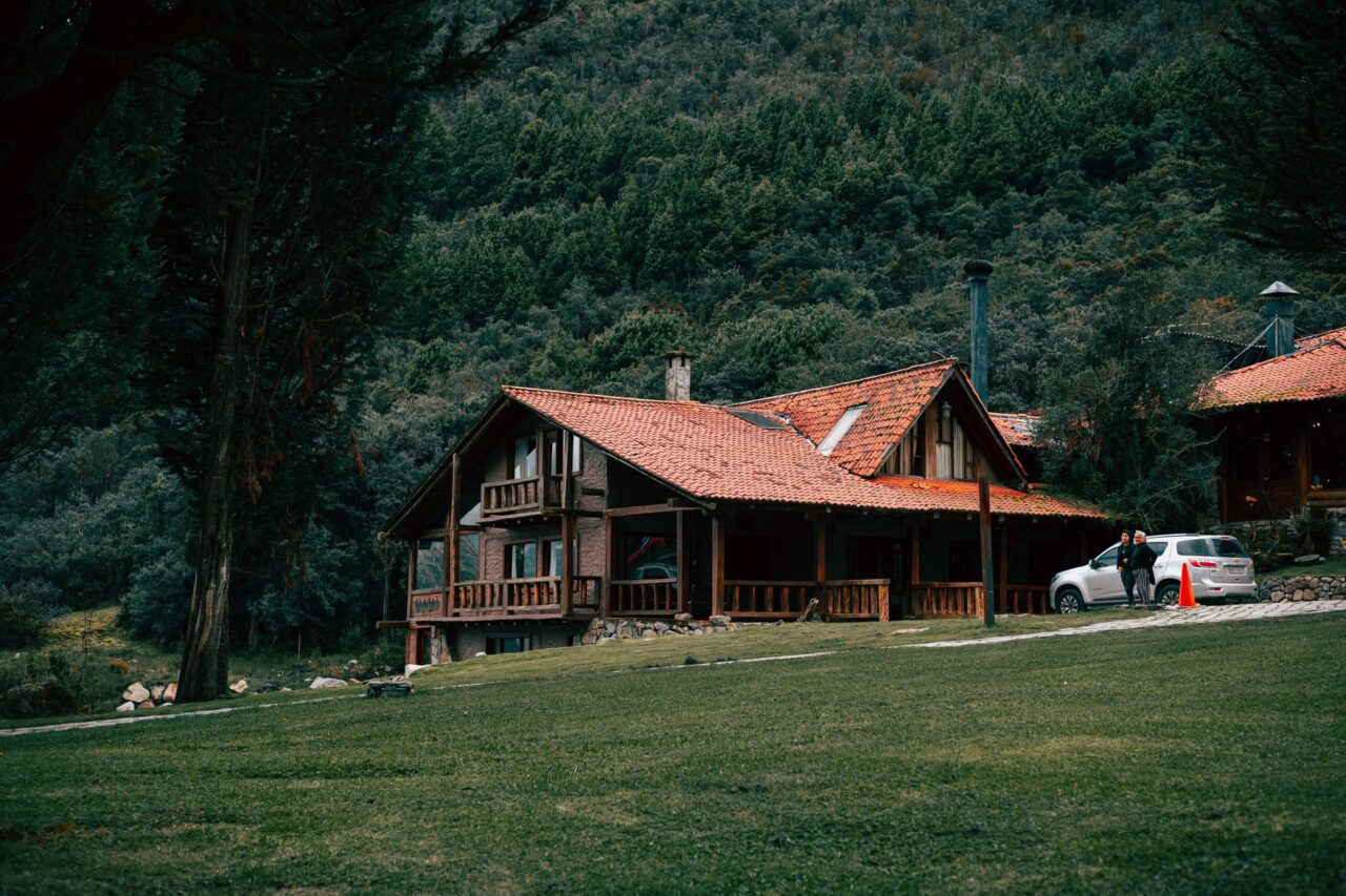 Wooden mountain lodge on a hill
