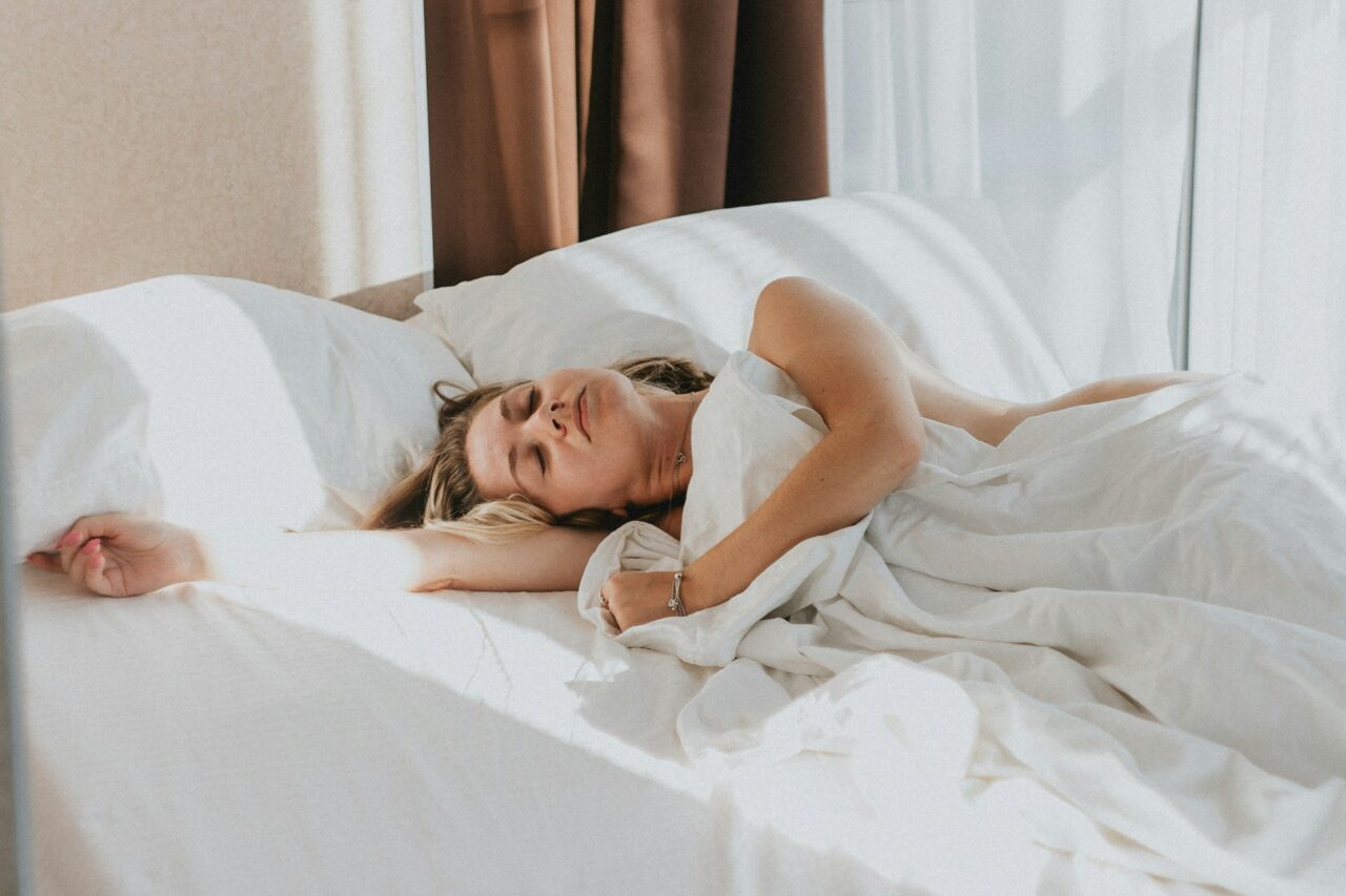 Woman lying in bed