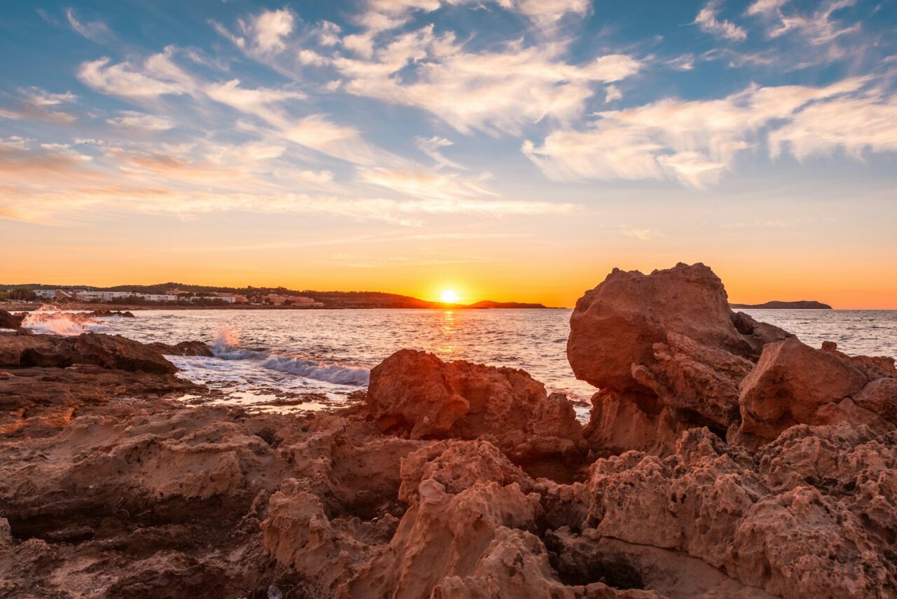 sun setting over the ocean in Ibiza