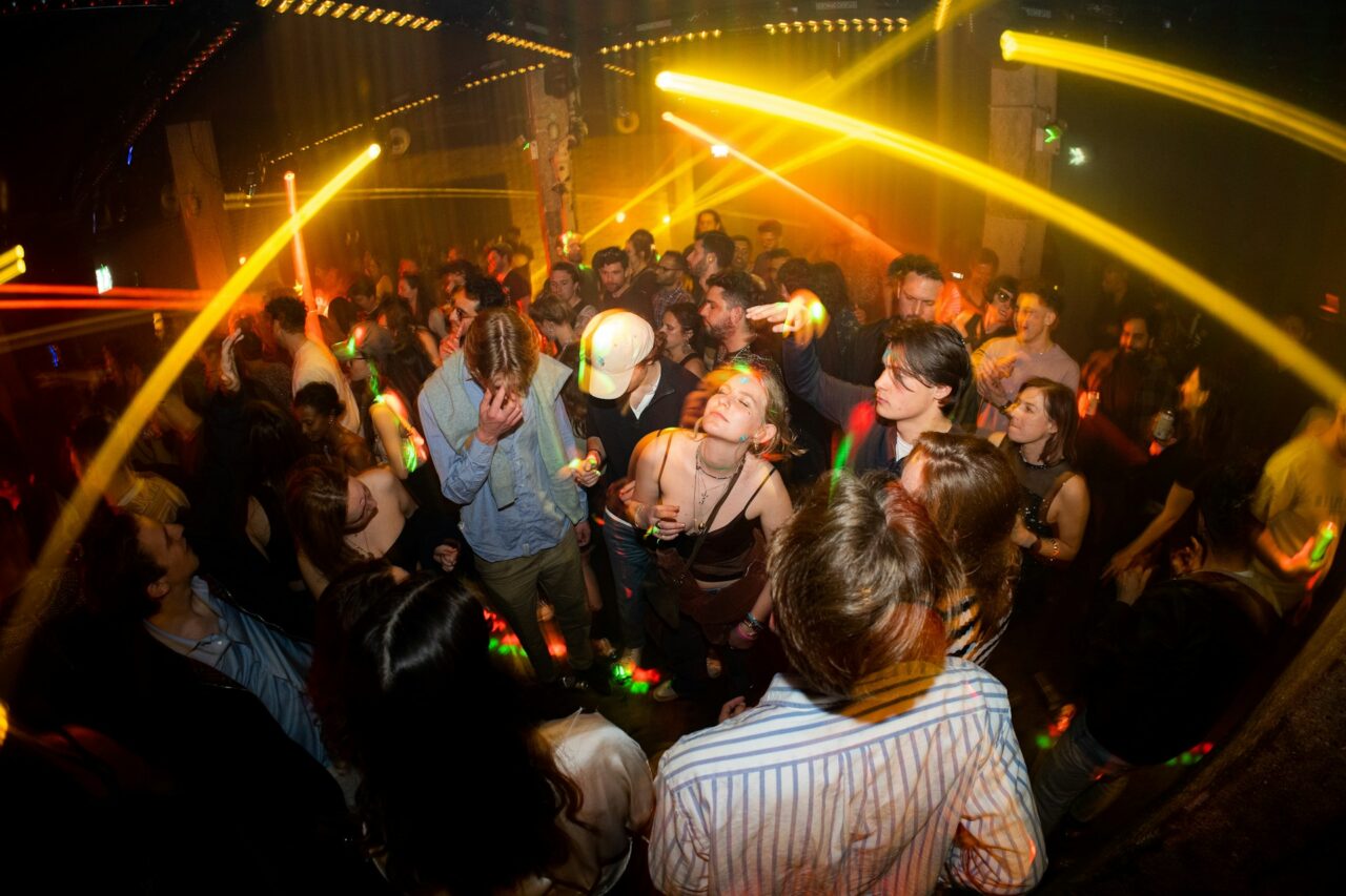 Group of people dancing in a nightclub