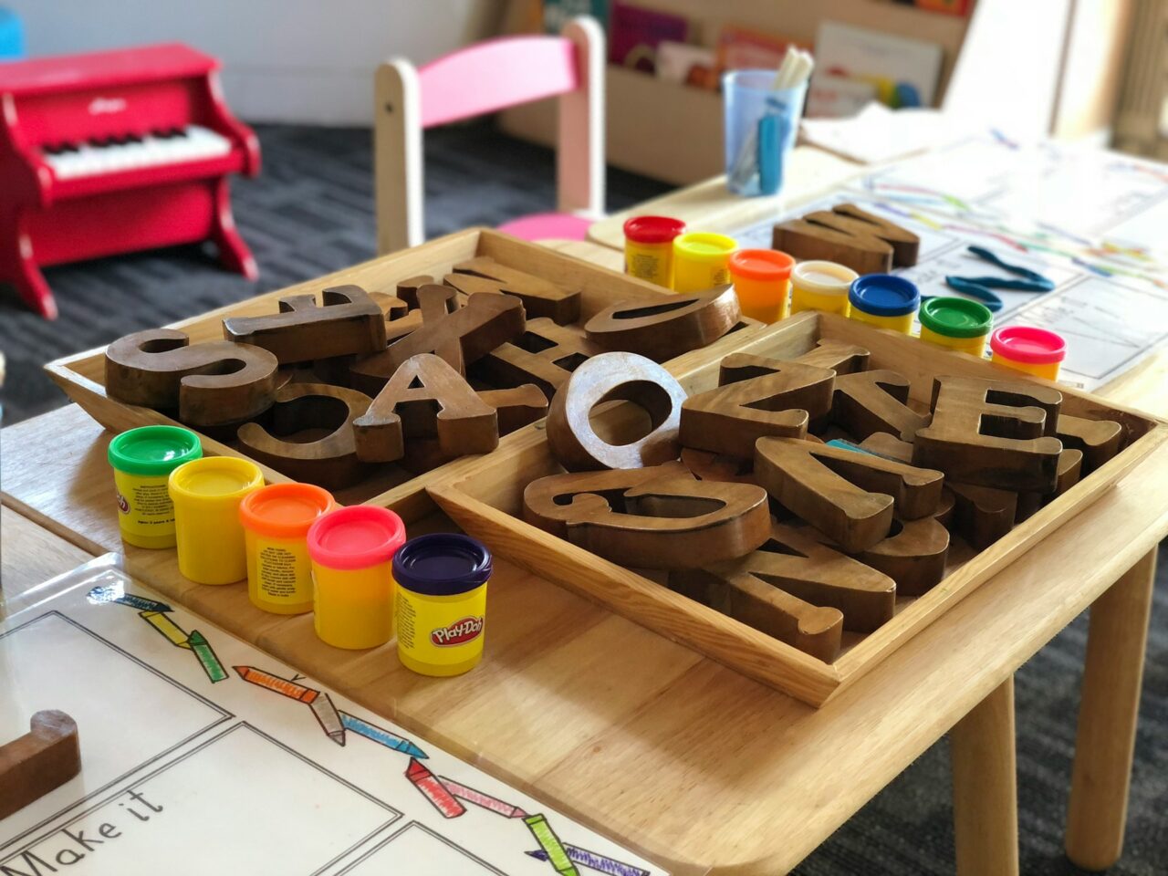 Wooden alphabets on a table at a daycare facility
